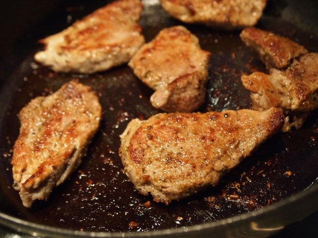 Pork fillets frying
