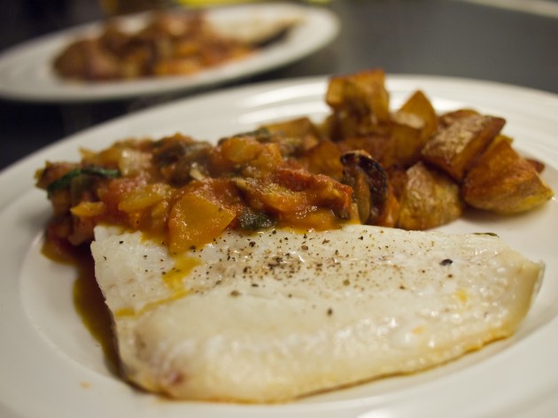 Fish baked in tomato sauce